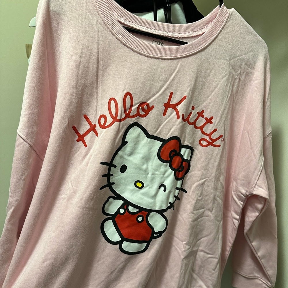 Hello Kitty & Sailor Moon jumpers Women’s size XL